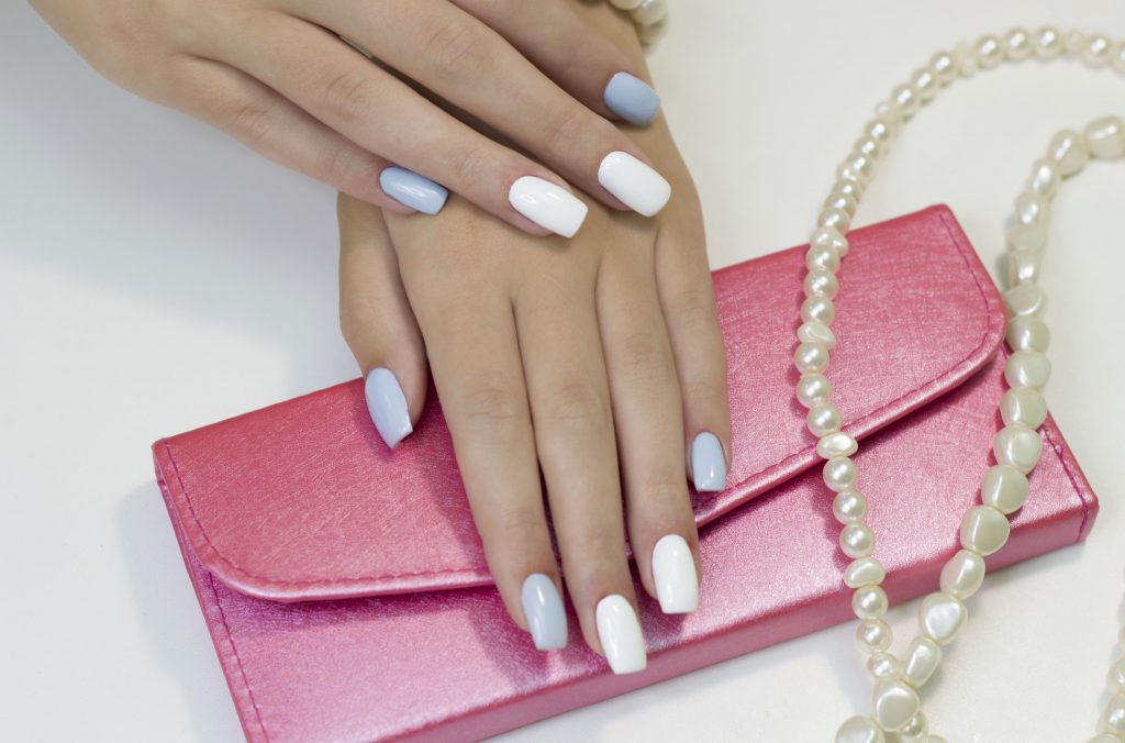 two-tone manicure with blue and white nail Polish
