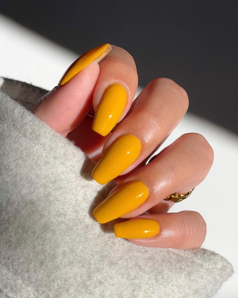These Mustard Yellow are perfect for Christmas nail color inspo