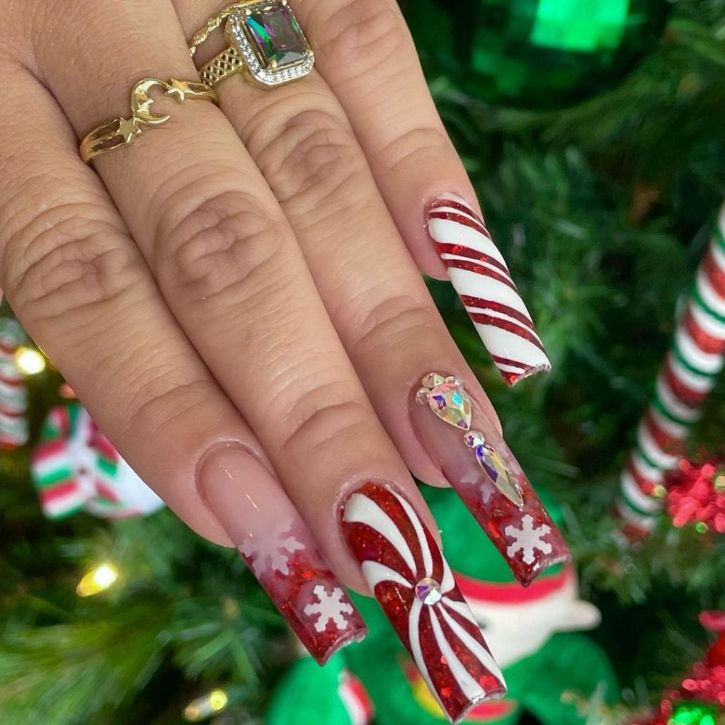This Red and White Peppermint Holiday Nail Design