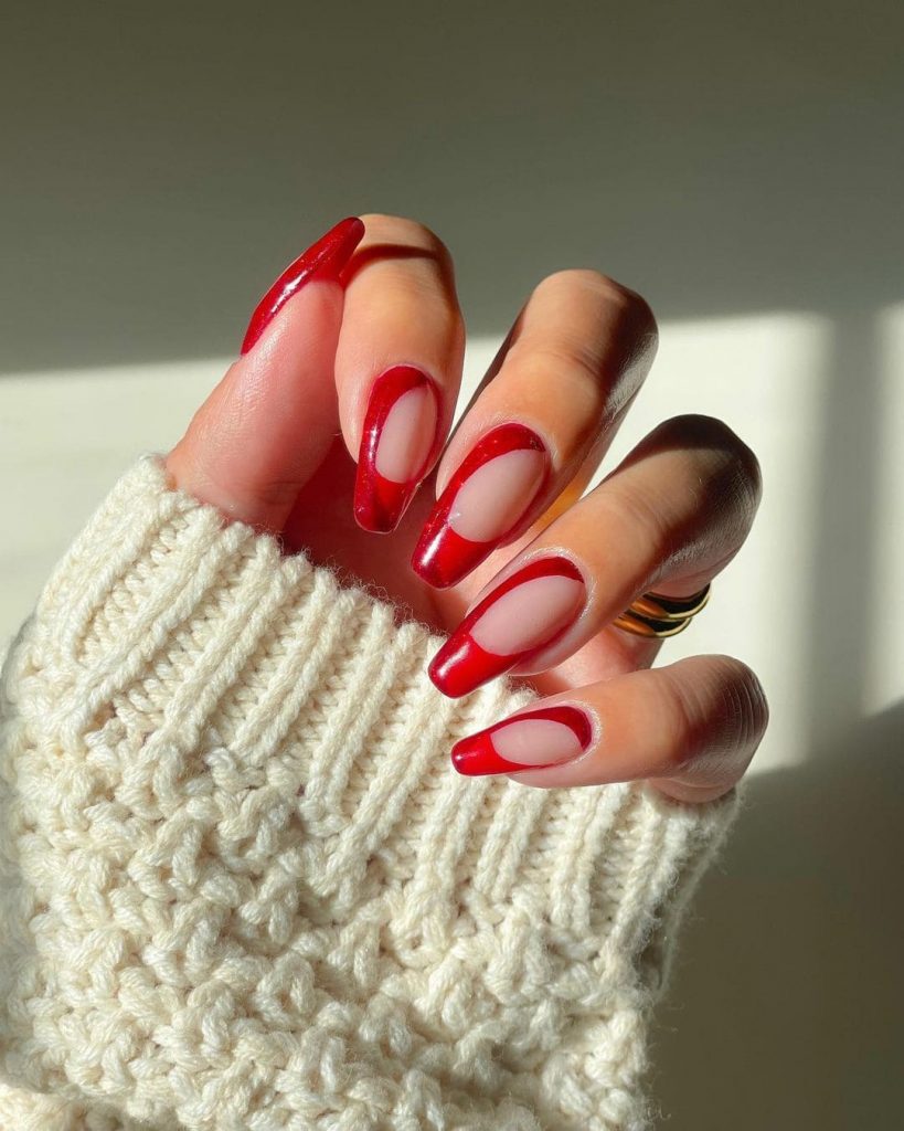 This candy cane nail design will be perfect this Christmas.