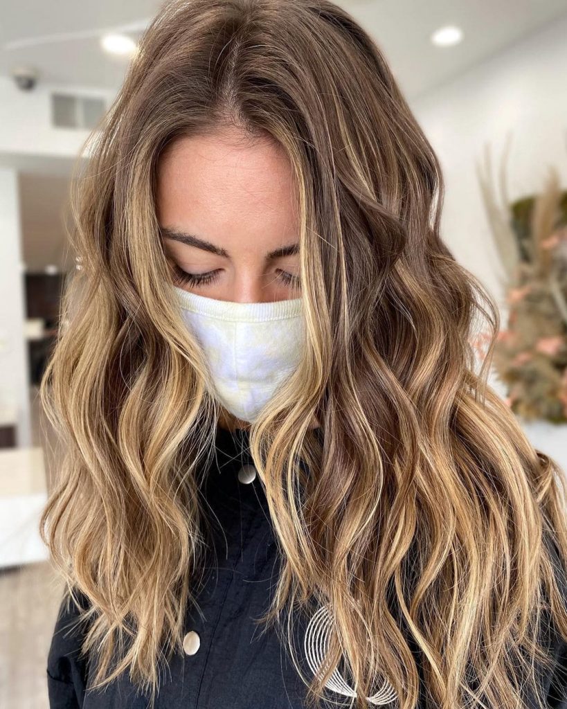 Long brown hair with blonde ends will make you fancy in 2022