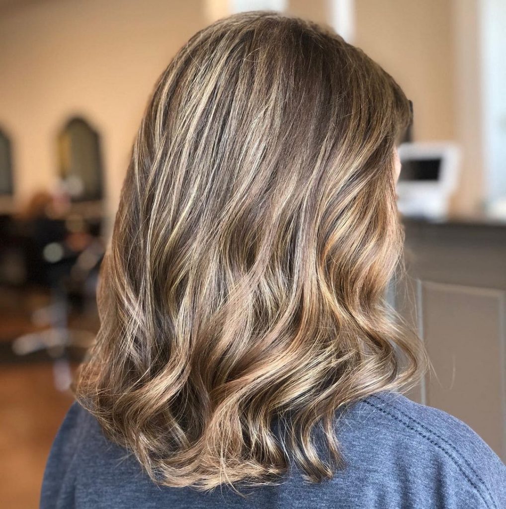 blonde color in curly brown hair