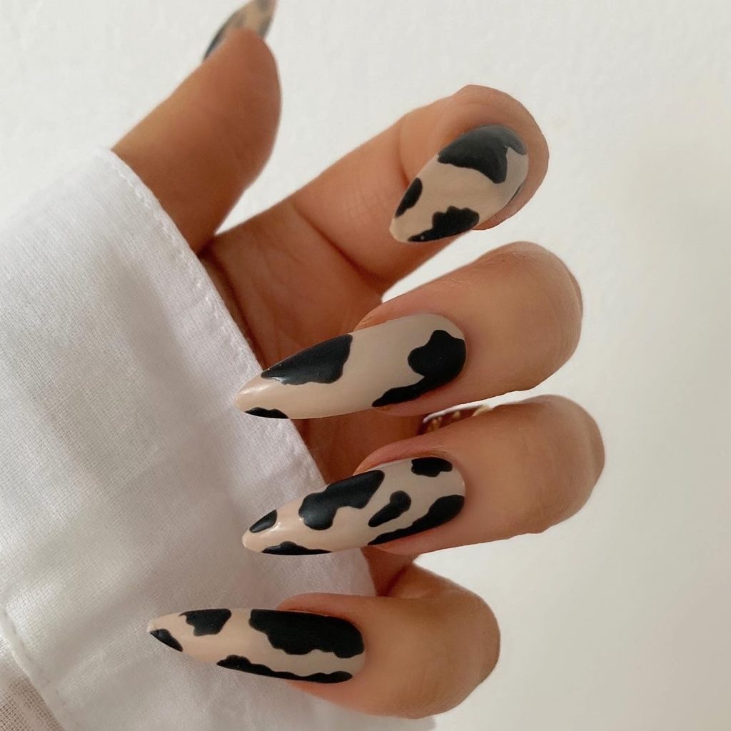 Nude And Black Cow Print Nails