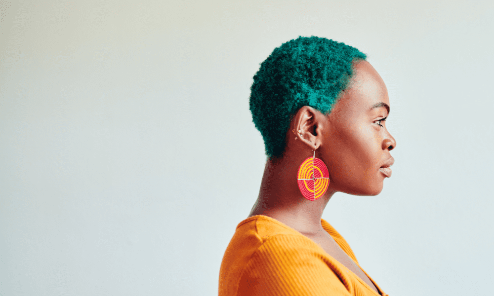 beautiful black woman with green shirt hair