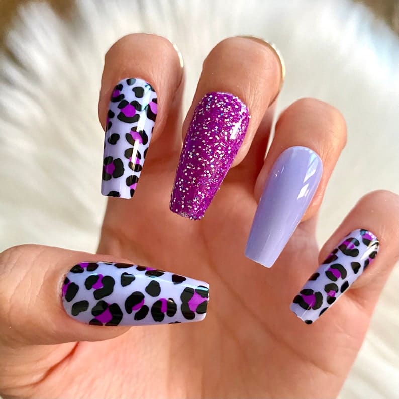 Glitter and Purple Cow Print Nails