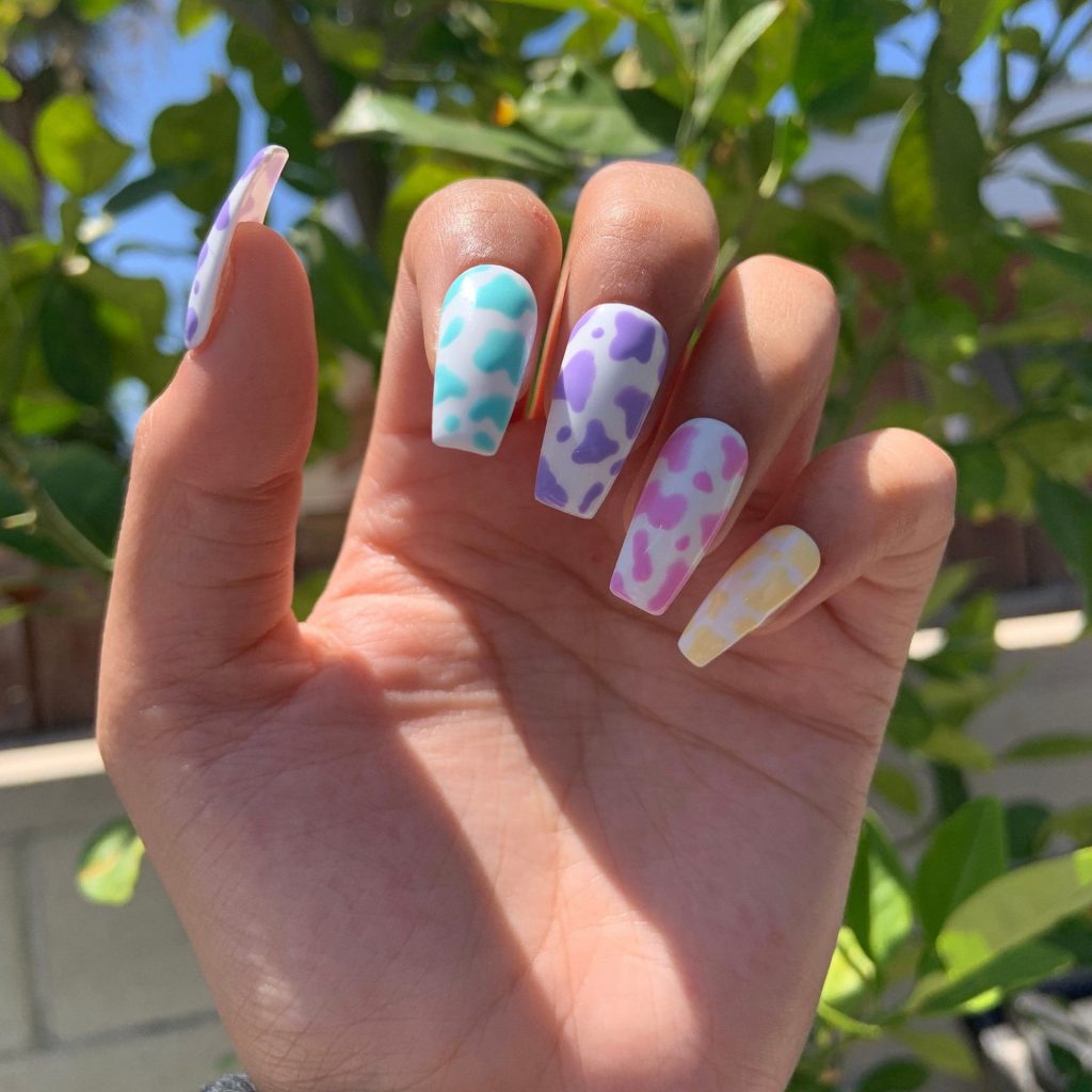 Acrylic Cloud And Cow Print Nails