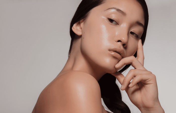 Asian woman with glowy skin