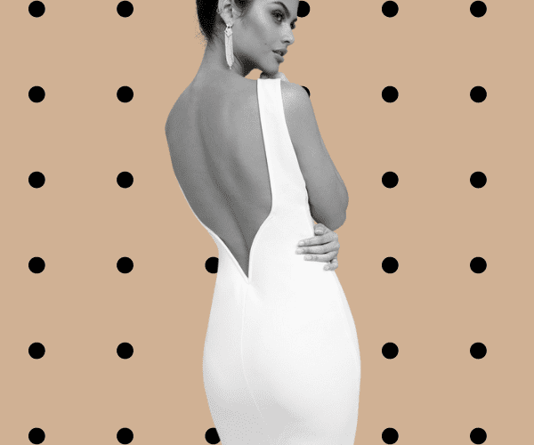 woman wearing white cocktail dress in black and white