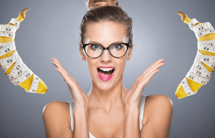 banana with tape measure, surprised woman